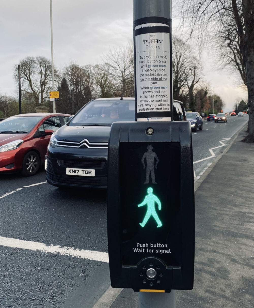 Interface to cross the road with an instruction notice