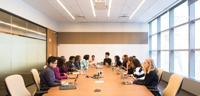 boardroom meeting to sign-off on ux plan
